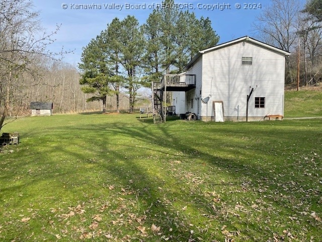 view of yard with a deck