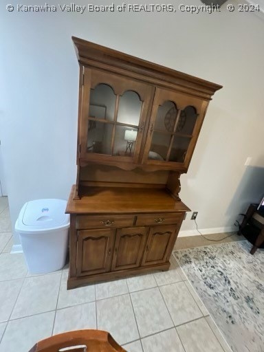 bathroom featuring tile floors