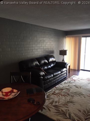 living room with wood-type flooring