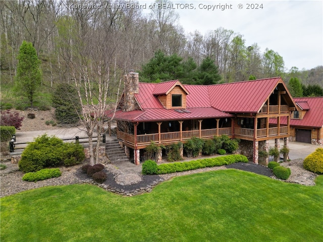 view of front of home featuring a garage and a front yard