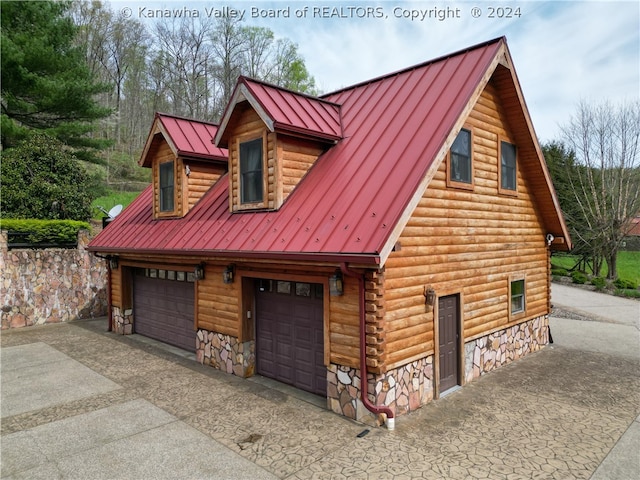 exterior space featuring a garage