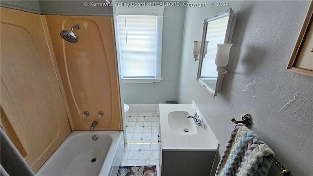 full bathroom featuring plenty of natural light, vanity,  shower combination, and toilet