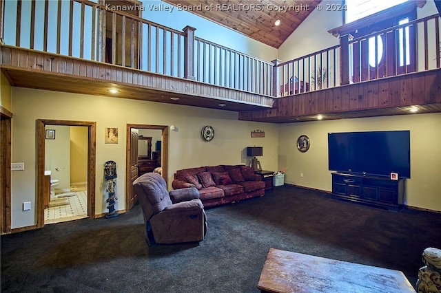 carpeted living room featuring high vaulted ceiling and wood ceiling