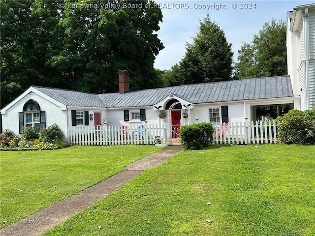 ranch-style home with a front yard