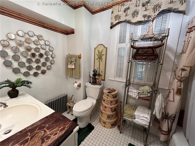 bathroom with radiator, crown molding, tile patterned flooring, vanity, and toilet