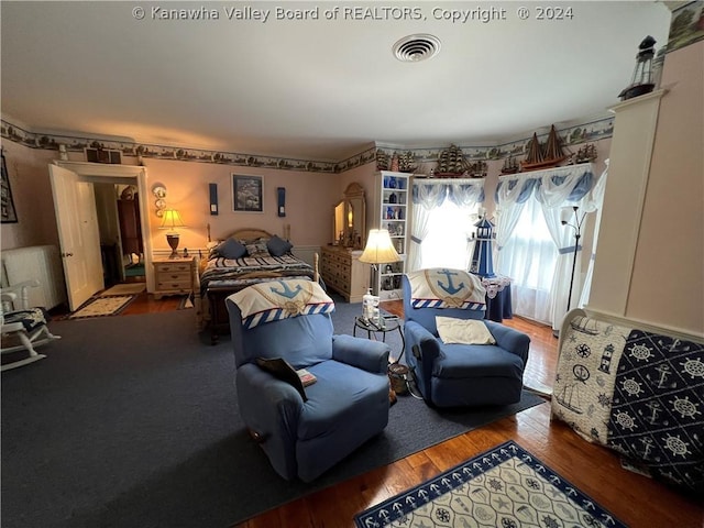 bedroom featuring hardwood / wood-style flooring