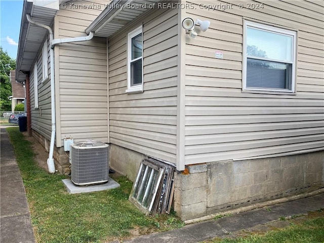 view of property exterior with cooling unit