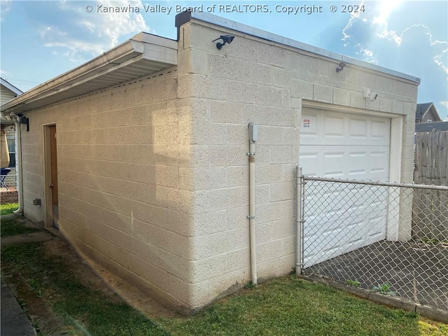 exterior space featuring an outdoor structure and a garage