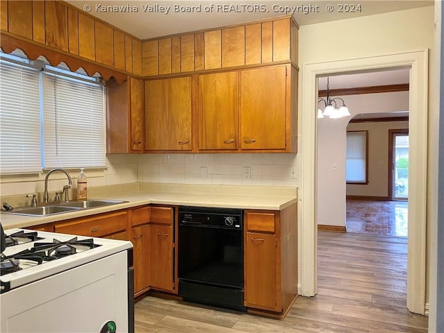 kitchen with dishwasher, decorative backsplash, sink, white gas stove, and light hardwood / wood-style flooring