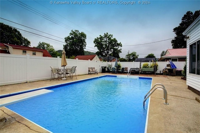 view of pool with a patio