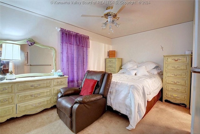 carpeted bedroom with ceiling fan