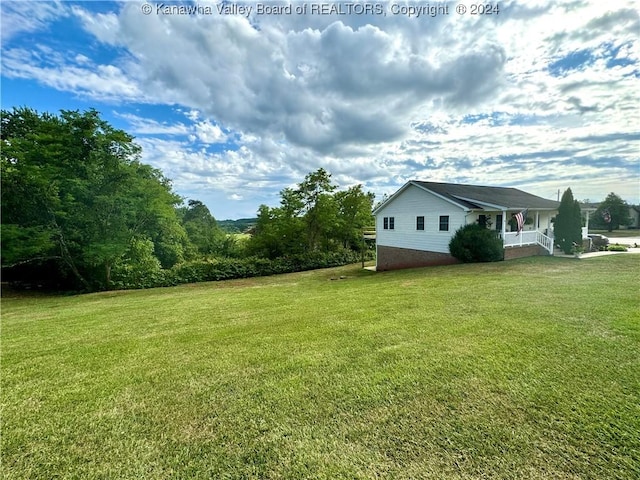 view of yard with a porch