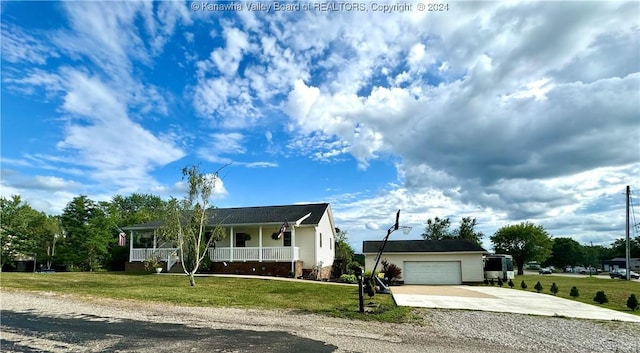 ranch-style house with a garage, a front yard, and a porch