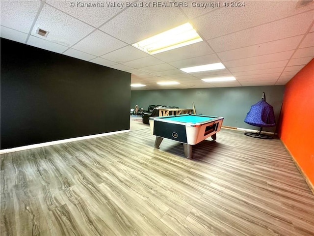 game room featuring pool table, a drop ceiling, and light wood-type flooring