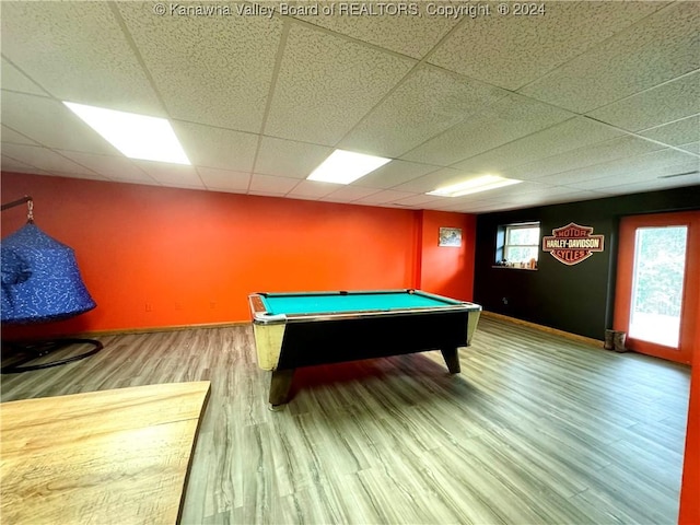 game room with pool table, wood-type flooring, and a paneled ceiling