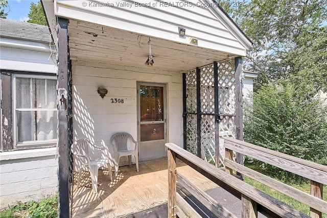 exterior space featuring a wooden deck