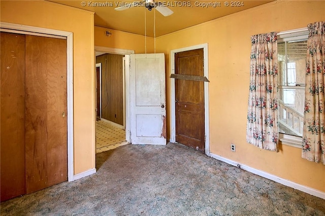 unfurnished bedroom featuring a closet and baseboards