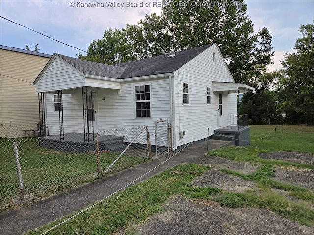 exterior space with a front lawn