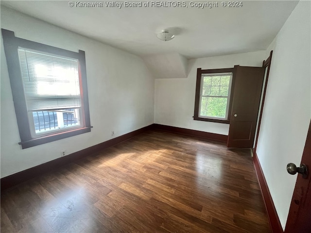 interior space with dark hardwood / wood-style floors