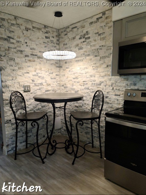 dining room featuring hardwood / wood-style flooring