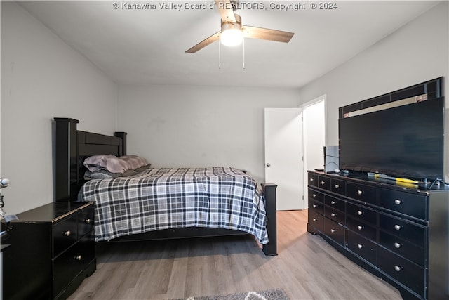 bedroom featuring ceiling fan and light wood-type flooring