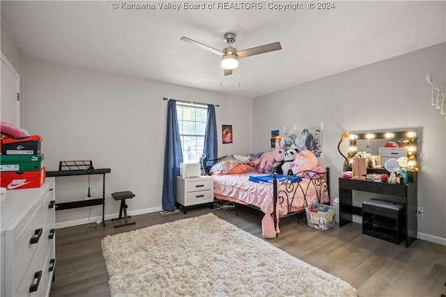 bedroom featuring ceiling fan and wood-type flooring