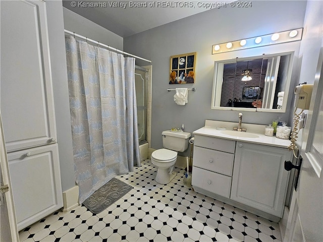 full bathroom featuring toilet, shower / tub combo, tile patterned flooring, and vanity