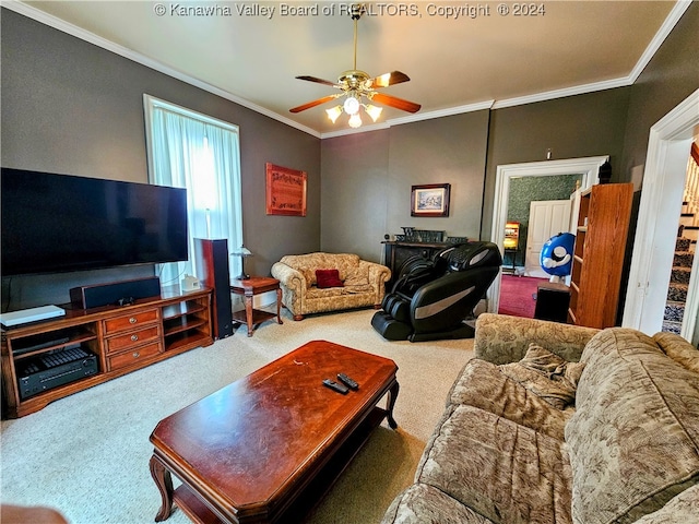 carpeted living room featuring ceiling fan and ornamental molding