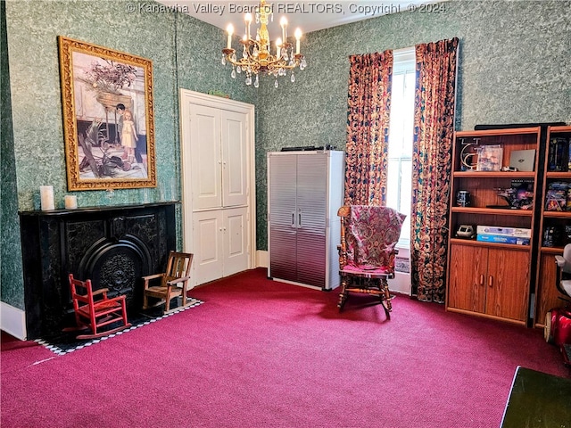 sitting room featuring a notable chandelier, plenty of natural light, and carpet flooring