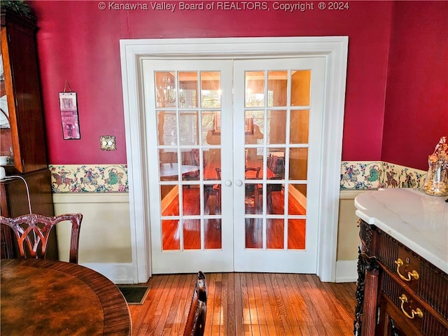 doorway to outside featuring hardwood / wood-style flooring and french doors