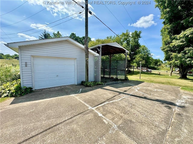 garage with a yard