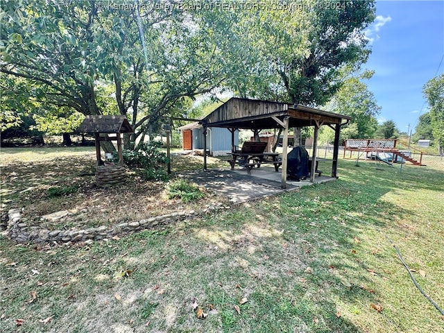 view of yard featuring a gazebo, a pergola, and a patio area