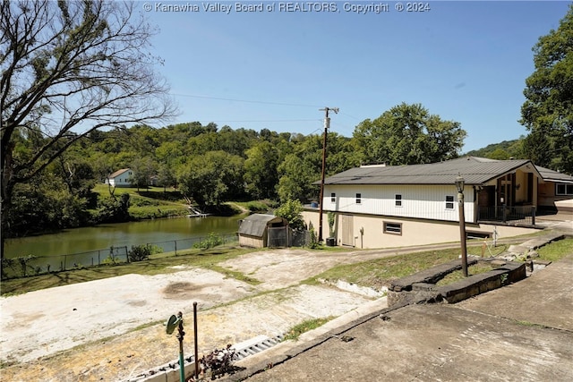 view of yard with a water view