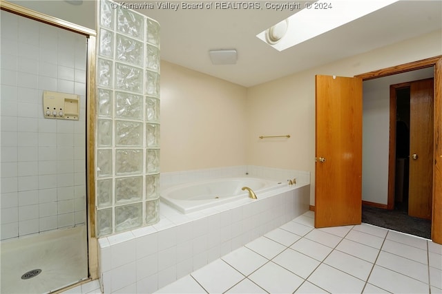 bathroom featuring separate shower and tub and tile patterned floors