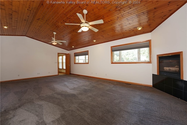 interior space with wood ceiling, ceiling fan, carpet, and vaulted ceiling