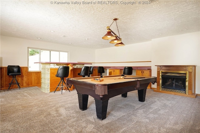 rec room featuring billiards, light colored carpet, and a textured ceiling