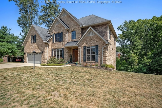 craftsman house featuring a front lawn and a garage