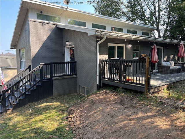 view of front of house with a deck