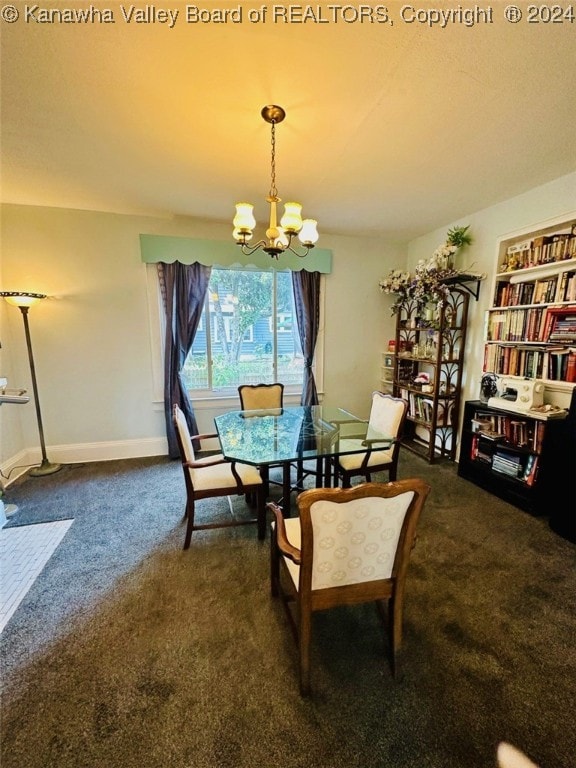 dining room featuring carpet flooring and a notable chandelier