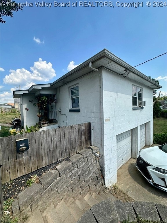 view of home's exterior featuring a garage