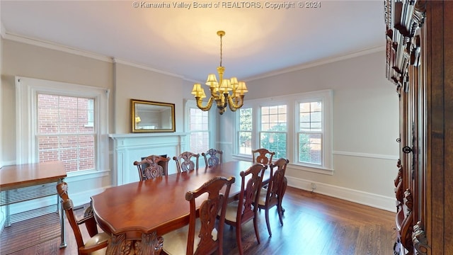 dining room featuring plenty of natural light, dark hardwood / wood-style flooring, and crown molding