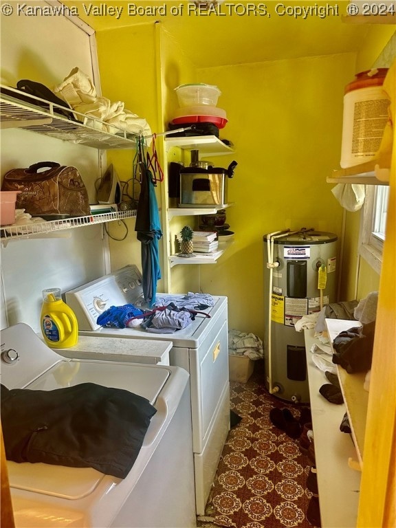 laundry area featuring washer and dryer and electric water heater