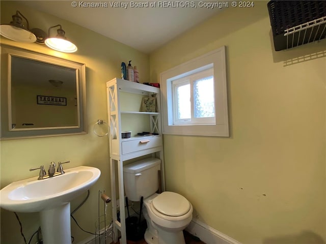 bathroom featuring toilet