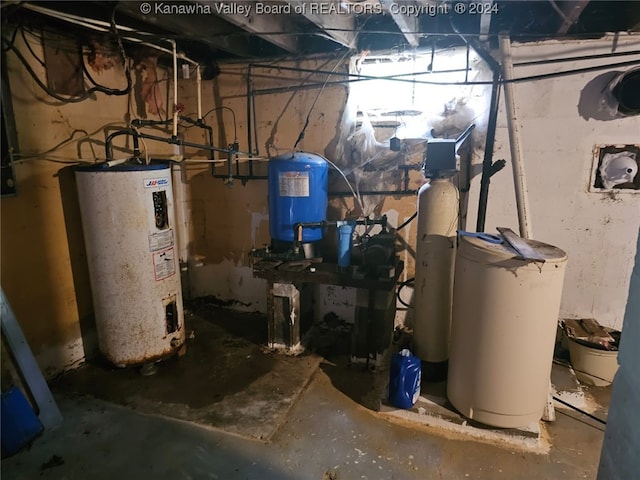 utility room featuring gas water heater