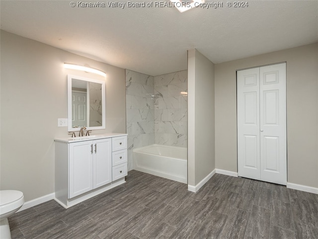 full bathroom featuring vanity, toilet, and hardwood / wood-style floors