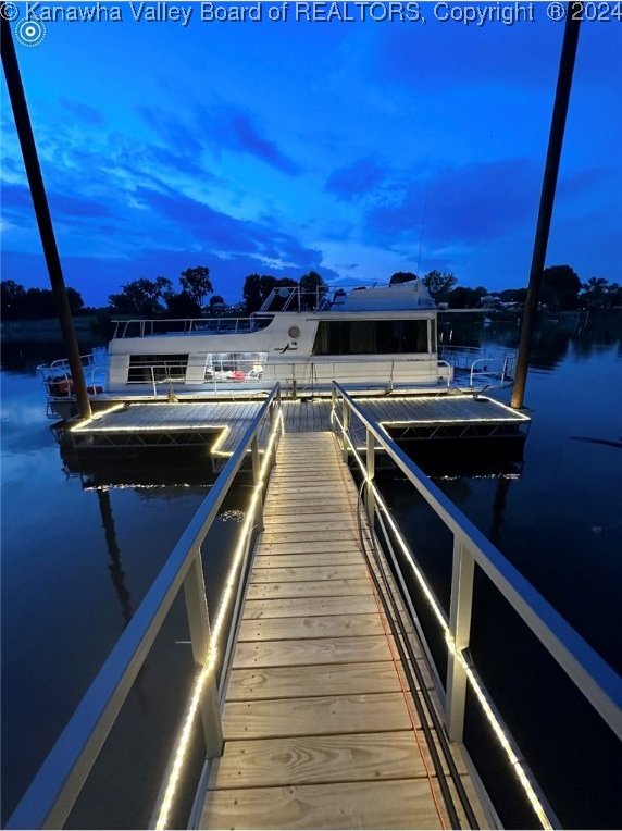 view of dock with a water view