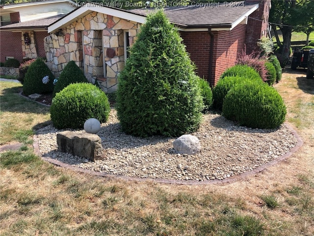 view of home's exterior featuring a lawn