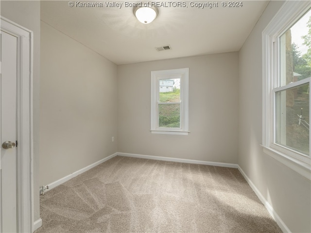 view of carpeted spare room