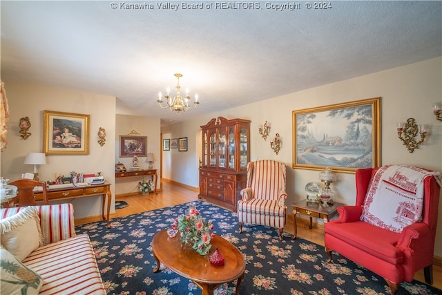 living room featuring a chandelier and hardwood / wood-style floors