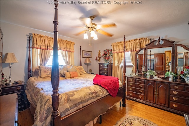 bedroom featuring ceiling fan and light hardwood / wood-style flooring